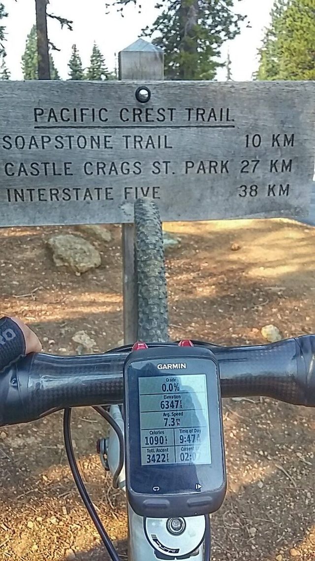 At the summit, I noticed a trail off the side of the road. Being on the 'cross bike, I got all excited. Then I saw the sign. No Bikes Allowed. Grrr.