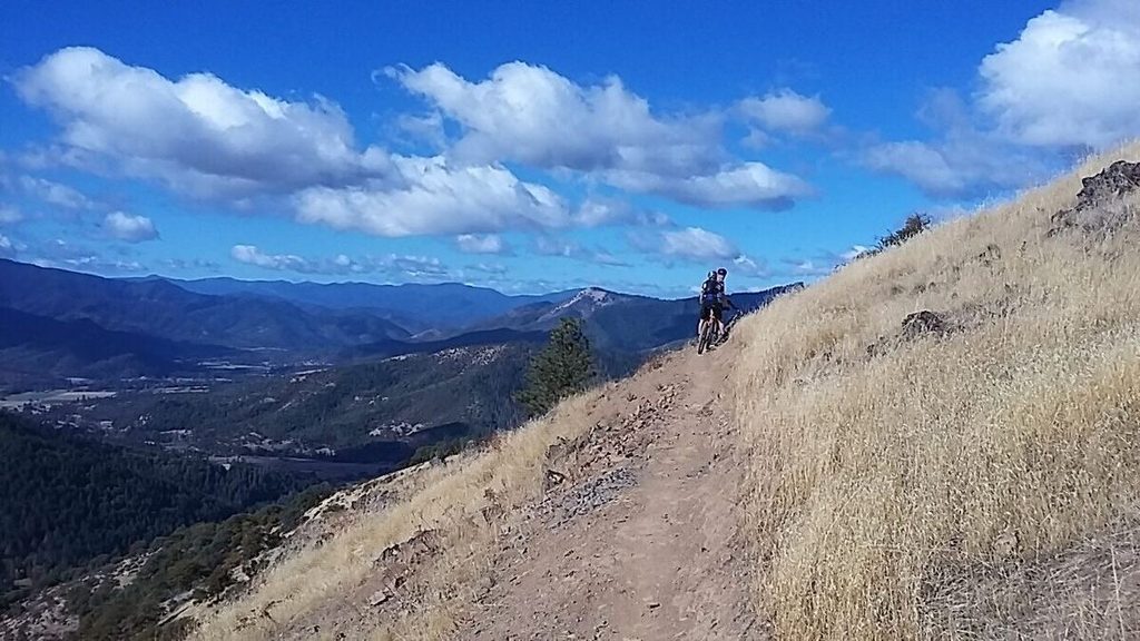It's hard not to stop and take at least one picture when the views look like this. Destry and Jared were blazing the trail on the proper bikes for the job.