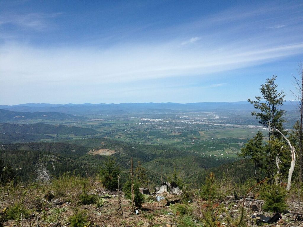 Rogue Valley views from a scenic overlook paved with shotgun shells and broken glass.