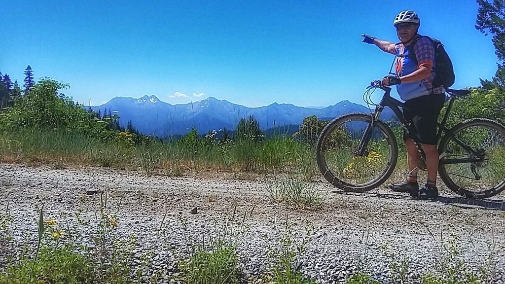 It's a long while of riding before you ever get your first decent view of the day. Hey, Dan! Where are the Red Buttes?