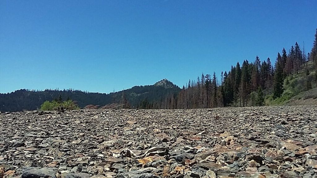 The promised land, Whisky Peak. The road drops down the other side just at the tree line at the left side of the peak. Almost there!