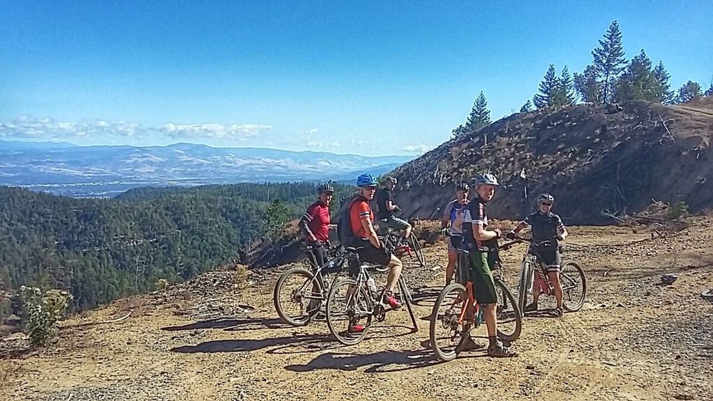 Yes, the smiles faded. But, they returned when we hit the top of the clear cut. Mostly out of joy at the fact we had all survived the monster climb of the day!